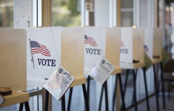 Voting booths. Photo credit: hermosawave / iStock Voting booths. Photo credit: hermosawave / iStock