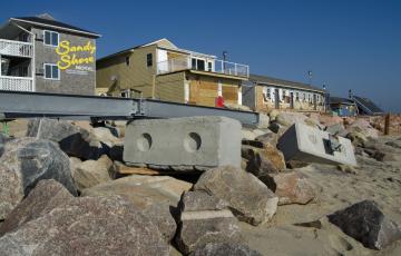 Post storm damage along a shore Post storm damage along a shore